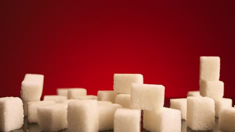 sugar cubes on a red background