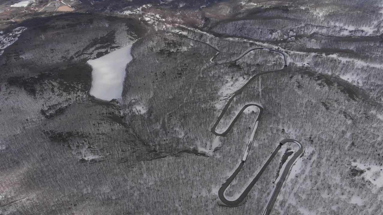 Aerial drone fly Mount Zaō Snow Covered Volcano Peaks landscape in Japan