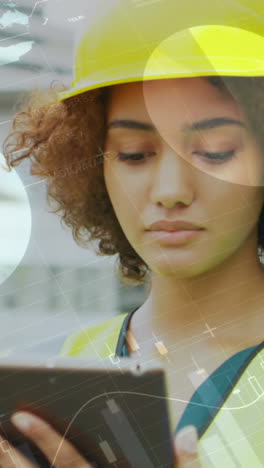 animation of statistics processing over female architect using tablet at construction site