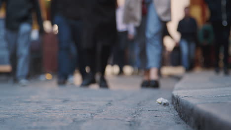 low angle view of people walking towards camera, and focal plane, on a busy london street