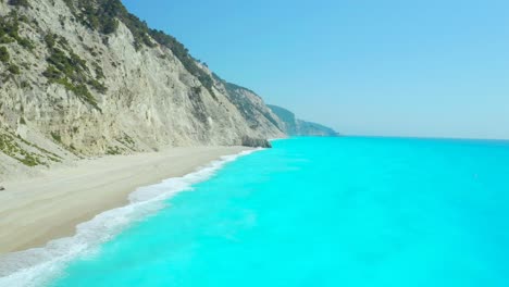 couple in empty beach egremni lefkada paradise