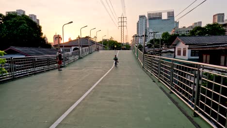 kids rollerblading and biking during sunset