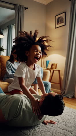a happy family plays and laughs in their living room