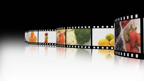 variedad de frutas y verduras en un carrete de película
