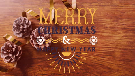 merry christmas and happy new year animation over wooden background with pine cone