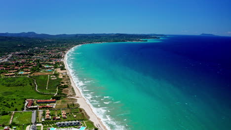 Aerial-drone-shot-over-the-long-stretching-beaches-in-the-north-of-Corfu-in-Greece