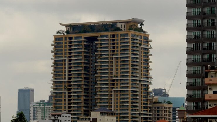 Cloud motion timelapse, high-rise properties, luxury urban accommodation