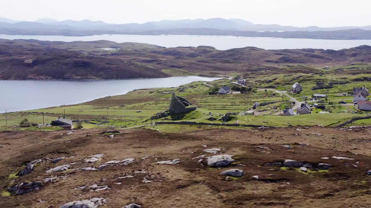 Wide angle drone shot of the 'Dun Carloway Broch' on the west coast of the Isle of Lewis, part of the Outer Hebrides of Scotland