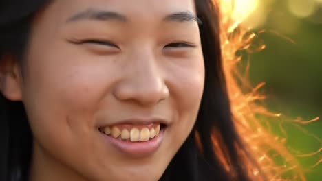 captivating smile: a glimpse into the joyful essence of a young woman bathed in the warm glow of sunset light, radiating happiness and natural beauty