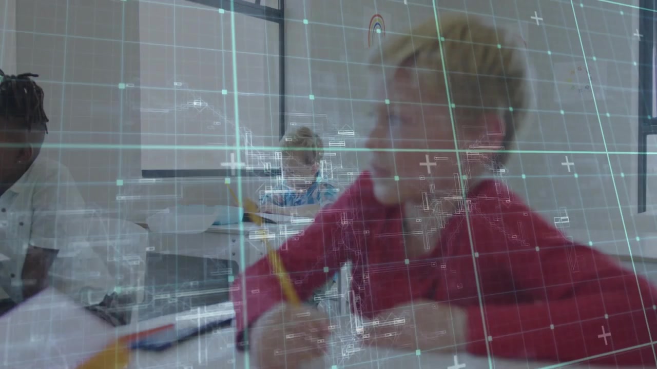 Boy in red writing with pencil while camera panning and grid overlay highlighting education visuals