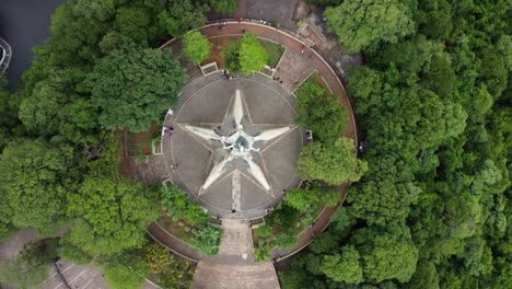 overhead shot of victory peace statue on top of hill, paraguay