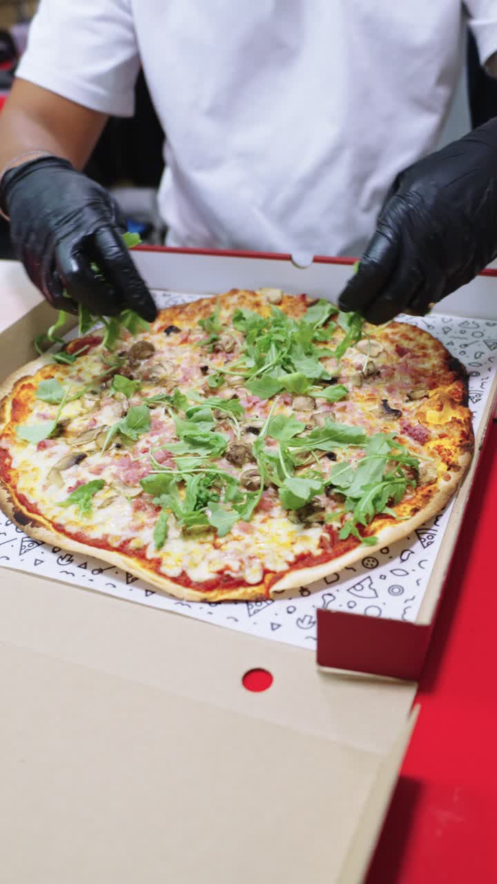 Preparing a fresh pizza