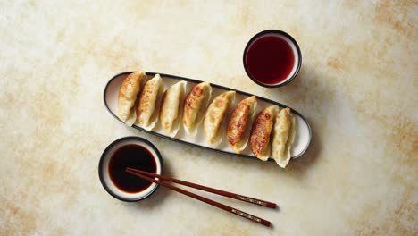 orginal asian dumplings gyoza served in long plate