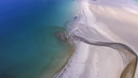 drone shot of the features of gress beach at low tide on the outer hebrides of scotland