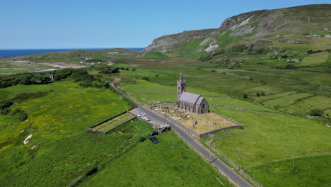 an old irish christian church nestled in a quiet valley of donegal, ireland