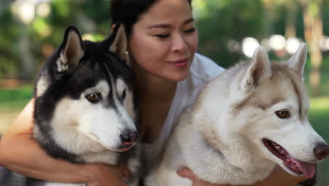 pet owner with her dogs