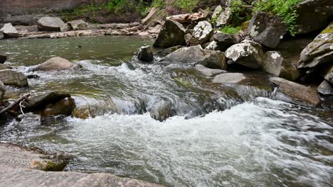 water running through shallow rocky rapids, west virginia