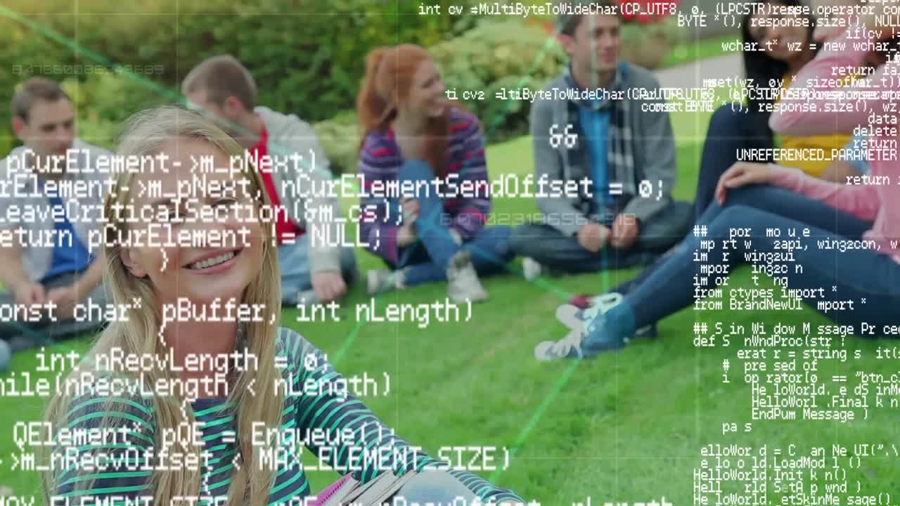 College students sitting on the grass