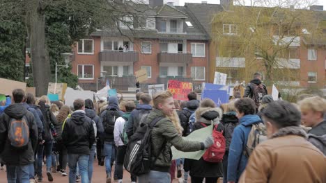 young people demonstrating for enviromental protection