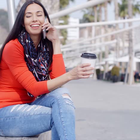 Relaxed-confident-young-woman-on-a-mobile