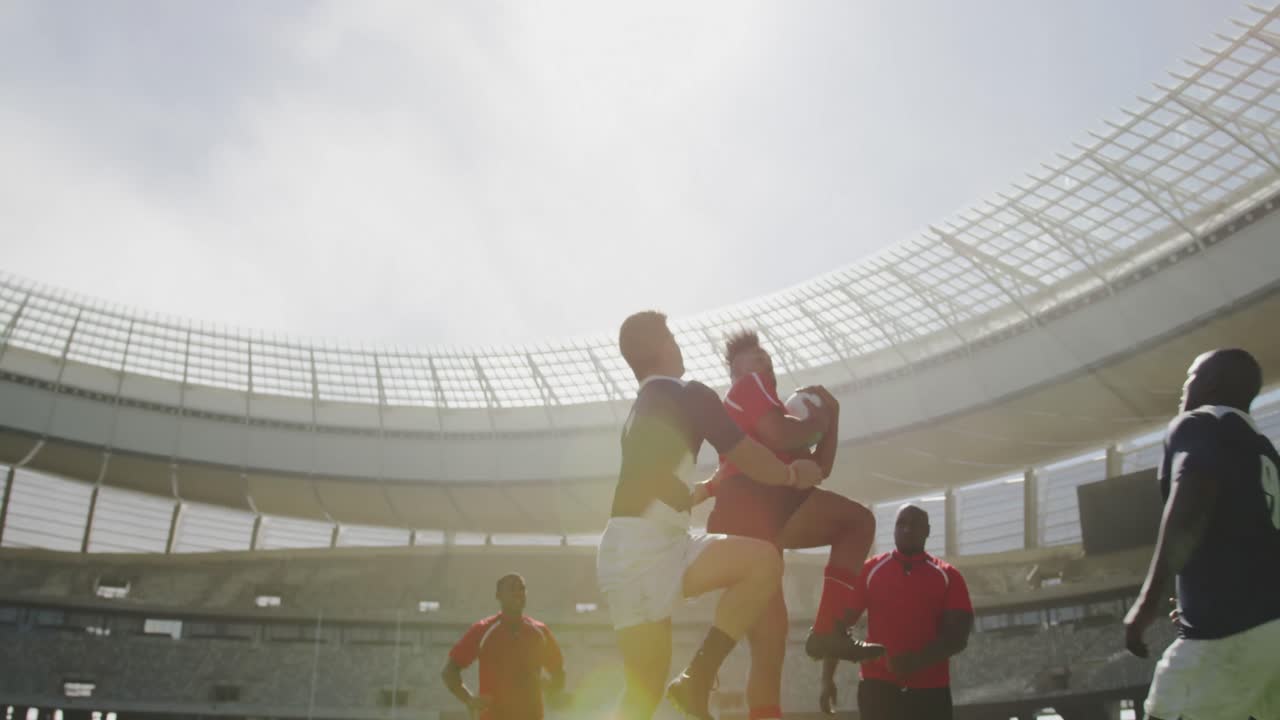 jugadores de rugby jugando un partido de rugby en el estadio 4k