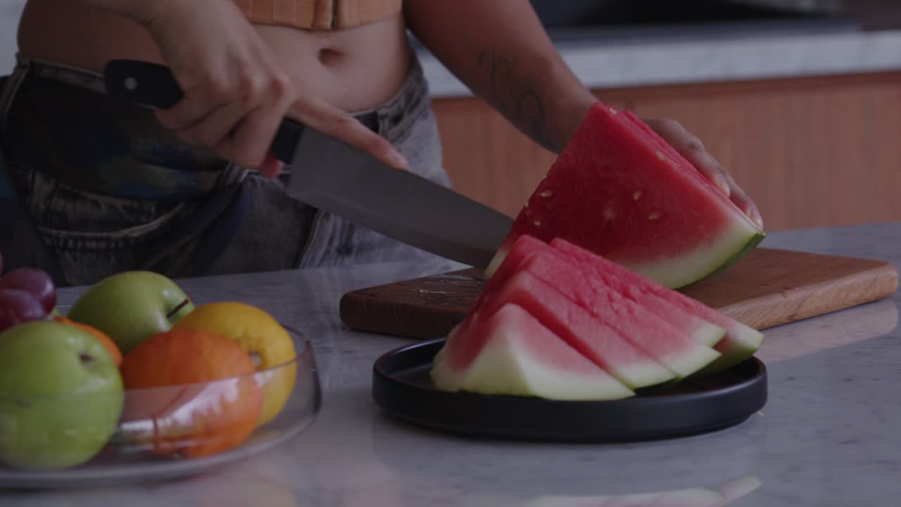 Creative fruit preparation and refreshing summer treats in the kitchen