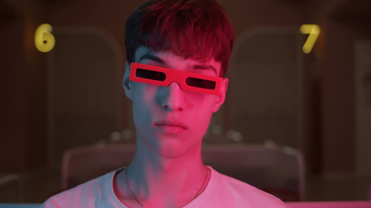 Portrait of a man with red sunglasses