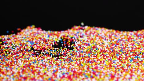 vibrant sprinkles cascading in dynamic patterns