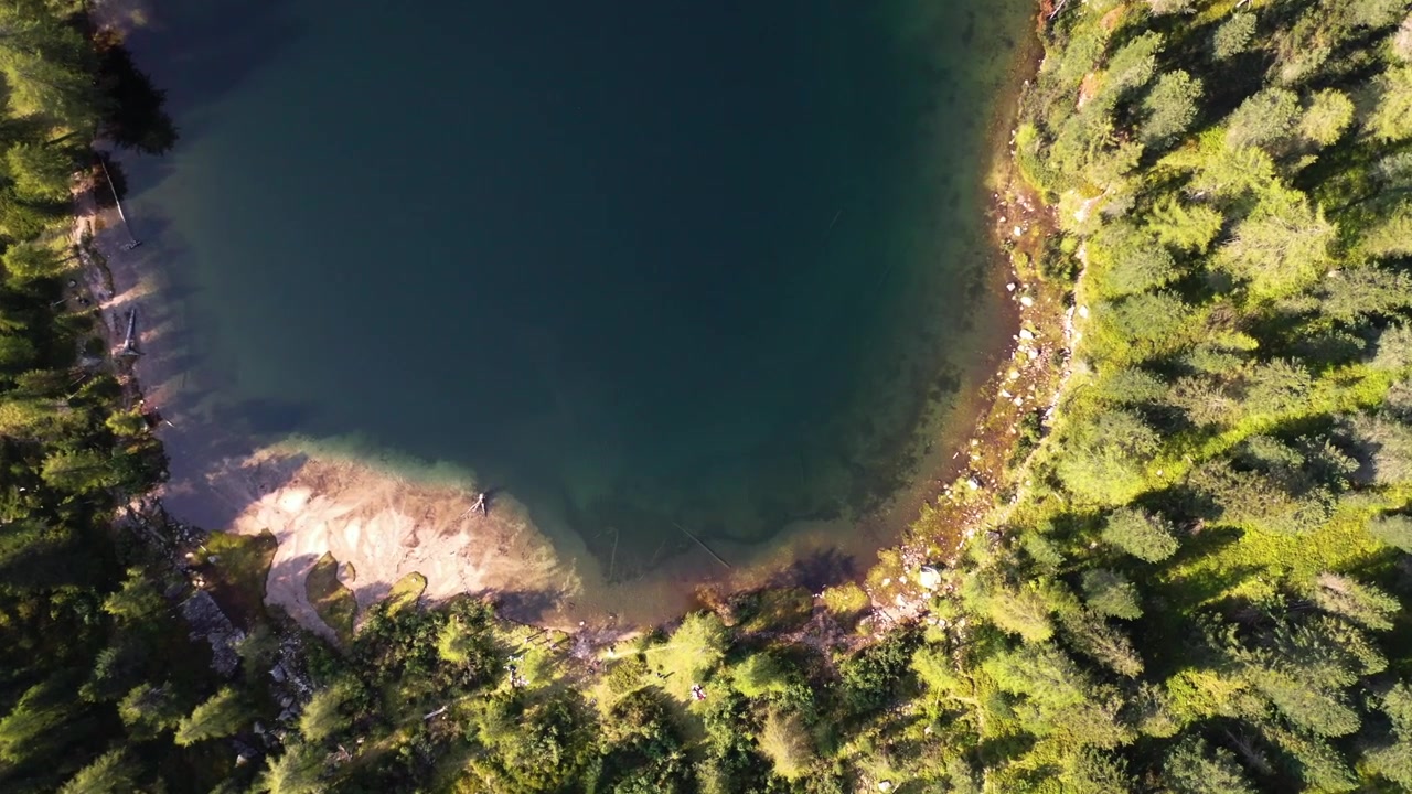 Lake in the Dolomites Flat Lay filmed with drone Location Name: Puntleider See