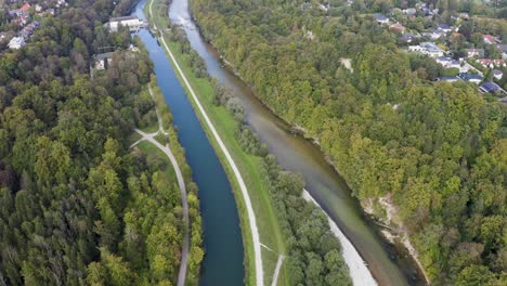 aerial view of the canalized part and natural part of the isar river near munich germany