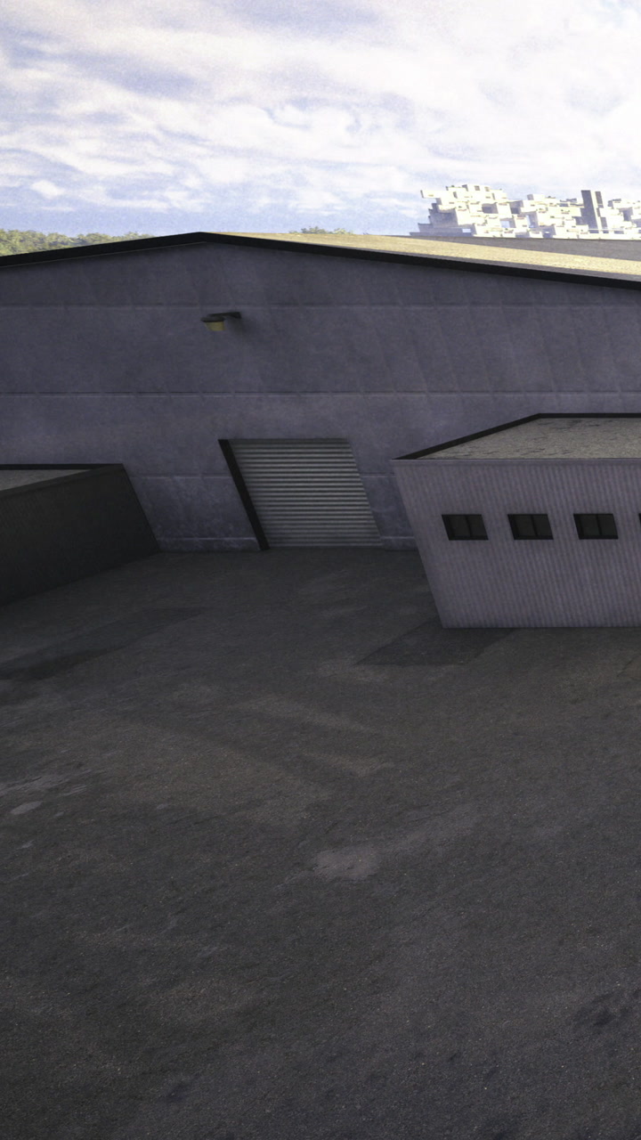 Warehouse structure in an industrial area near hills and trees during daytime