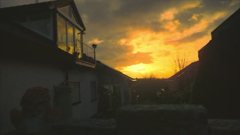 fiery morning sky - dramatic sunrise over foggy neighborhood in 4k