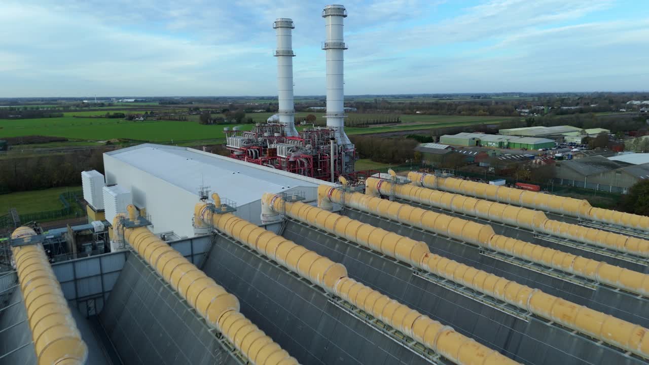 High-altitude aerial shot of the Sutton Bridge CCGT facility, highlighting its landmark presence near the River Nene and the Lincolnshire border