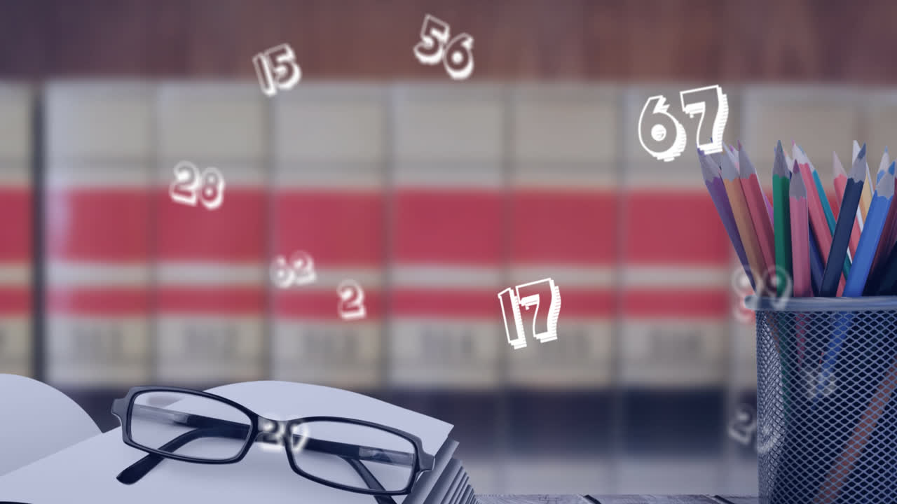 animación de números sobre objetos escolares en clase