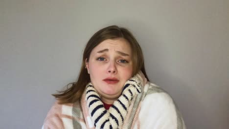 Female-Young-Student-Looking-Visibly-Unwell-Coughing-Whilst-Talking-to-Camera-On-Video-Call