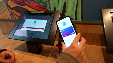 contactless payment with google pay at a restaurant