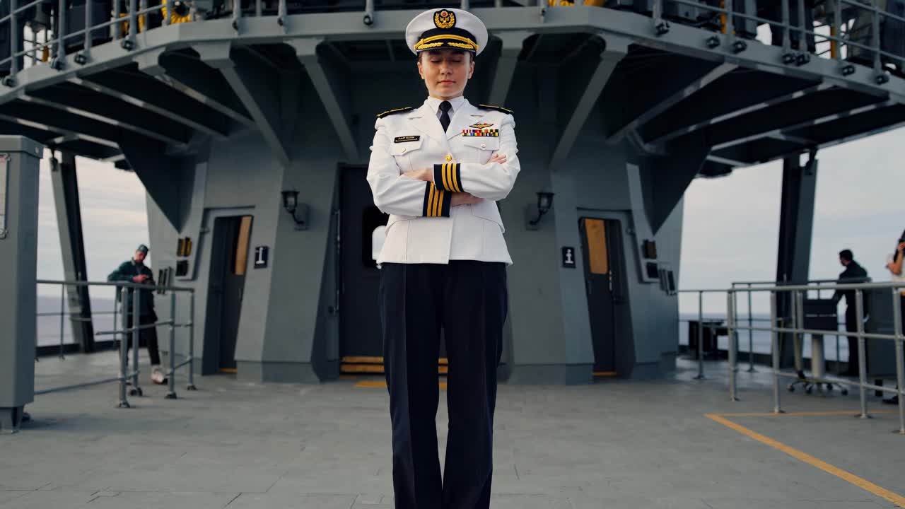 Female naval captain standing confidently on warship deck, white uniform symbolizing leadership and professionalism in maritime military service