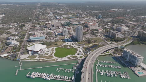 high aerial view of downtown clearwater, florida panning around to intracoastal water view