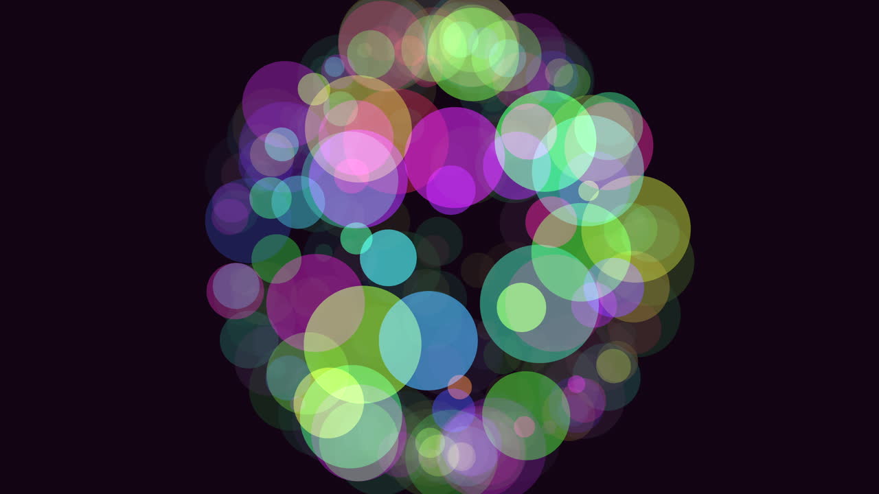 círculos vibrantes en formación circular suspendidos en el aire sobre un fondo negro