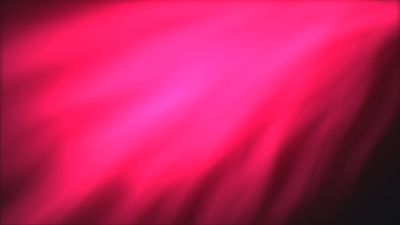 Una misteriosa luce rossa illumina sottilmente lo sfondo scuro, la cui origine è invisibile. Il bagliore enigmatico crea un momento visivo suggestivo e intrigante.