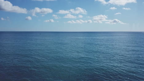 sea waves and blue sky aerial view in sunny day