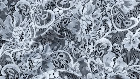 close-up view of beautiful white floral lace fabric