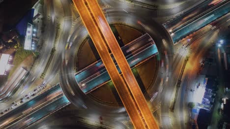 time lapse aerial view and top view of traffic round road and building