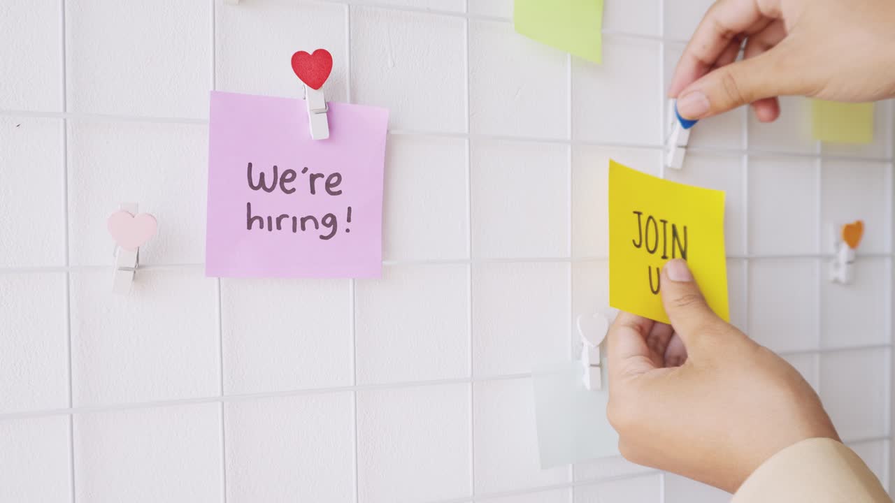 Text Of We're Hiring And Join Us Written On Sticky Notes And Put On Wall