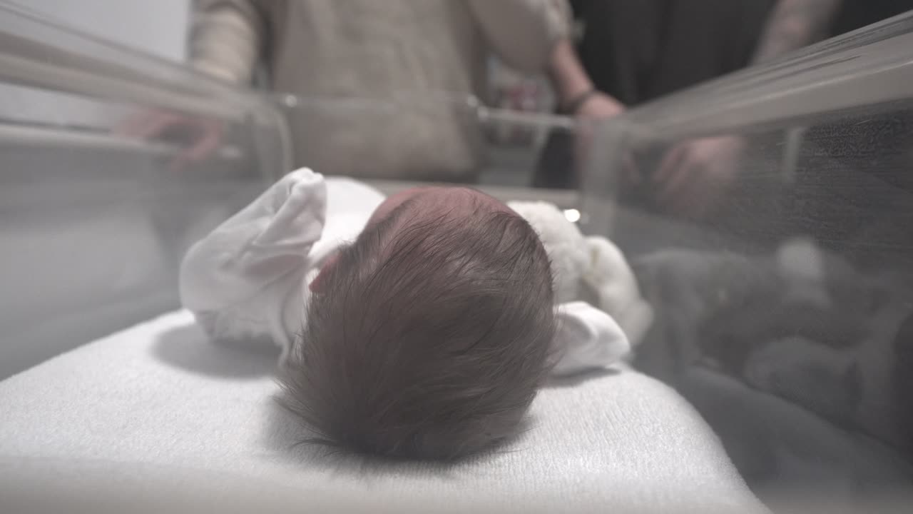 Neonatal hospital ward, touching family emotions, first life moments