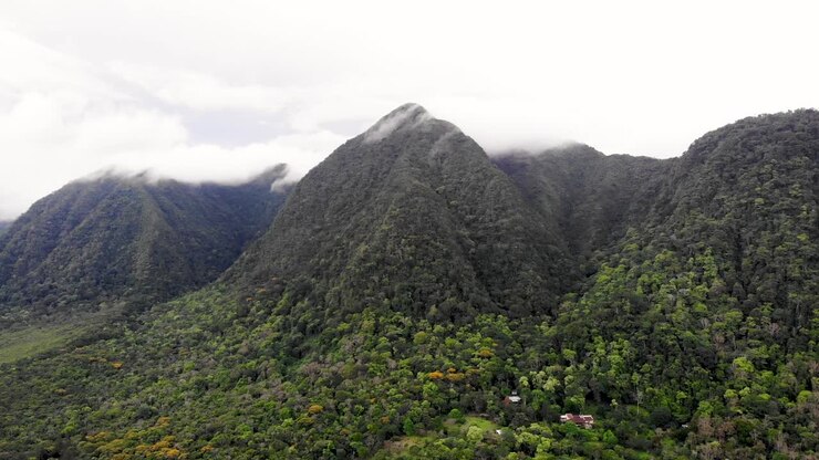 Valle de Anton volcanic crater walls in central Panama remnant of an extinct volcano, Aerial pan right shot
