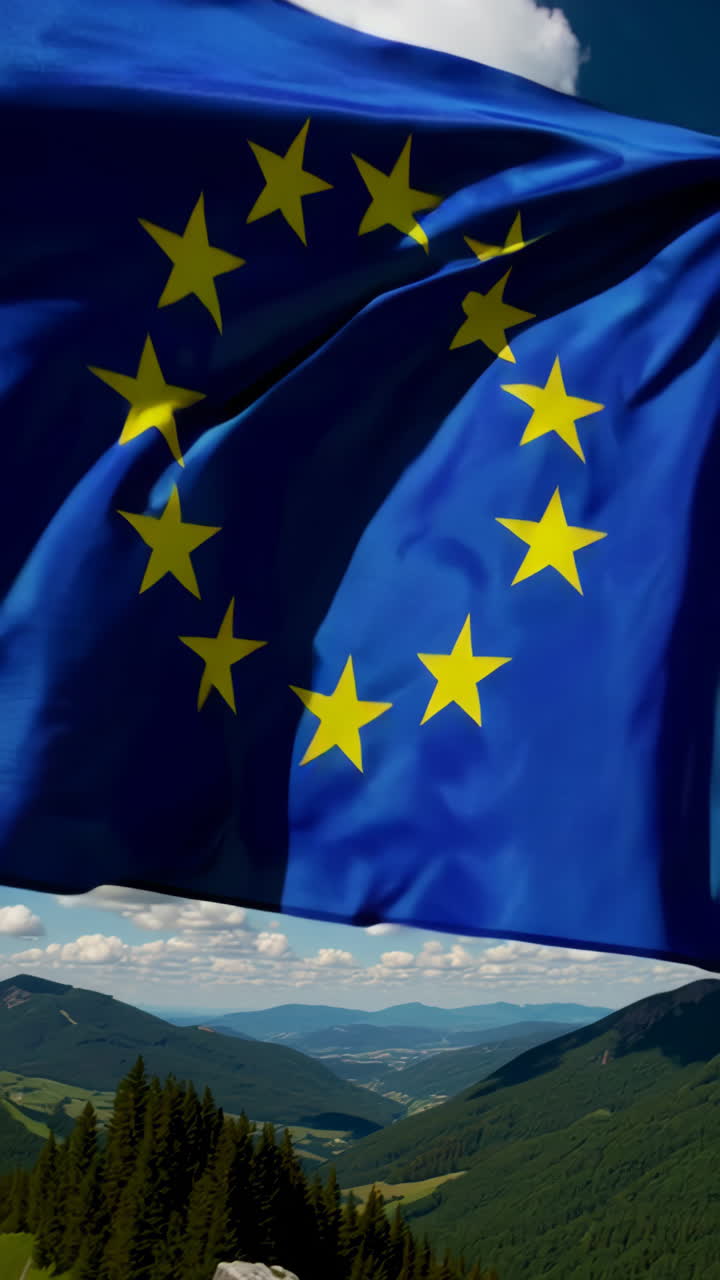 Bandiera dell'Unione Europea in un paesaggio montuoso