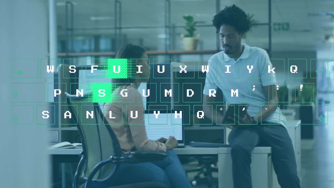 Animation of letters illuminating over multiracial coworkers discussing over tablet at desk