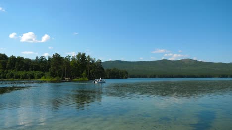 lake scenery with motorboat