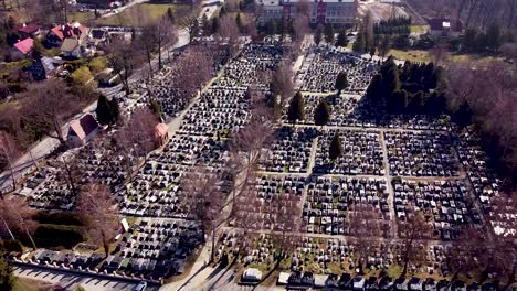 aerial shot of huge modern graveyard on sunny morning